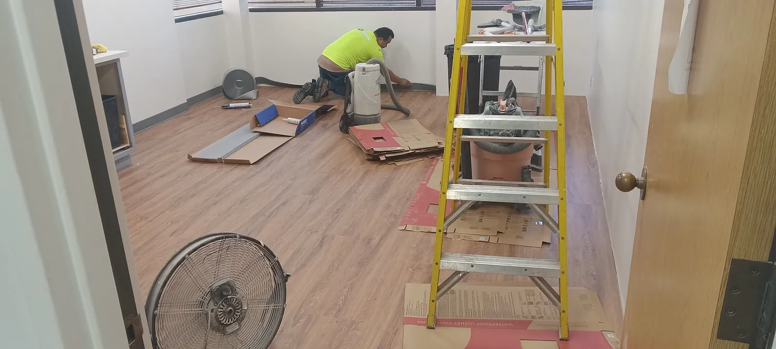 Flooring work during a completed break room remodel in Bellflower
