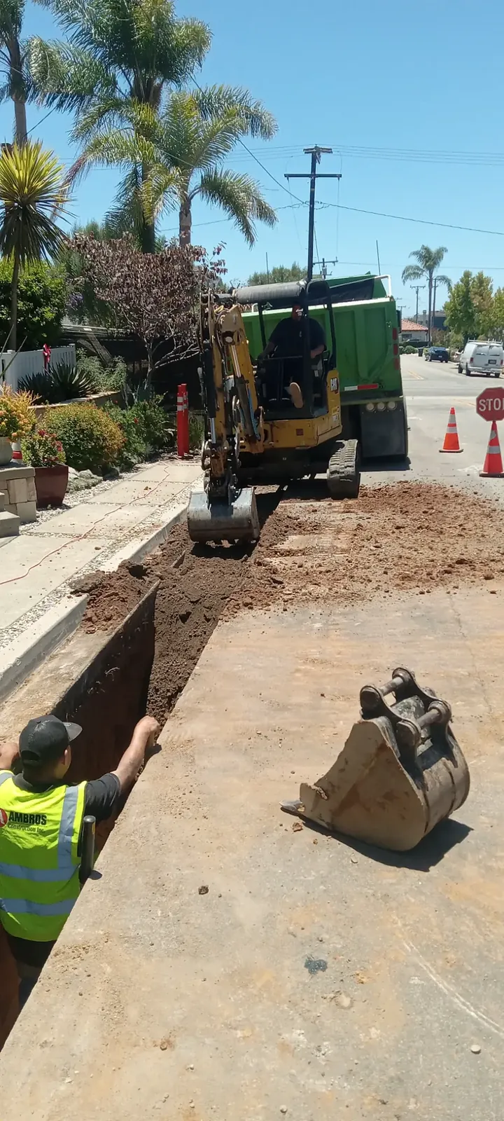 Excavation work during completed underground utility connection work in Newport Beach