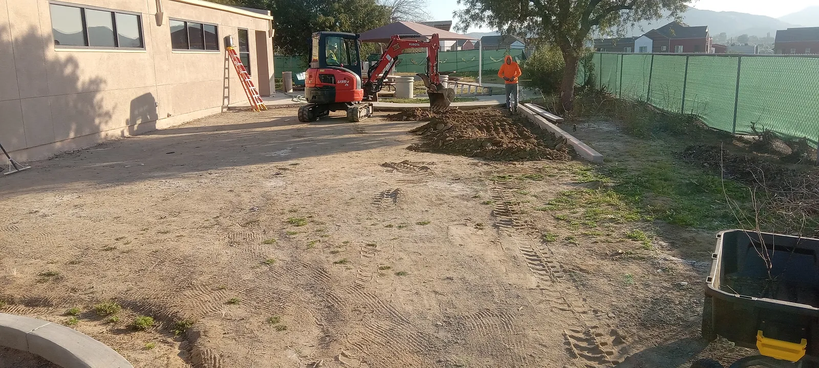 Equipment at a completed decomposed granite installation in Norco