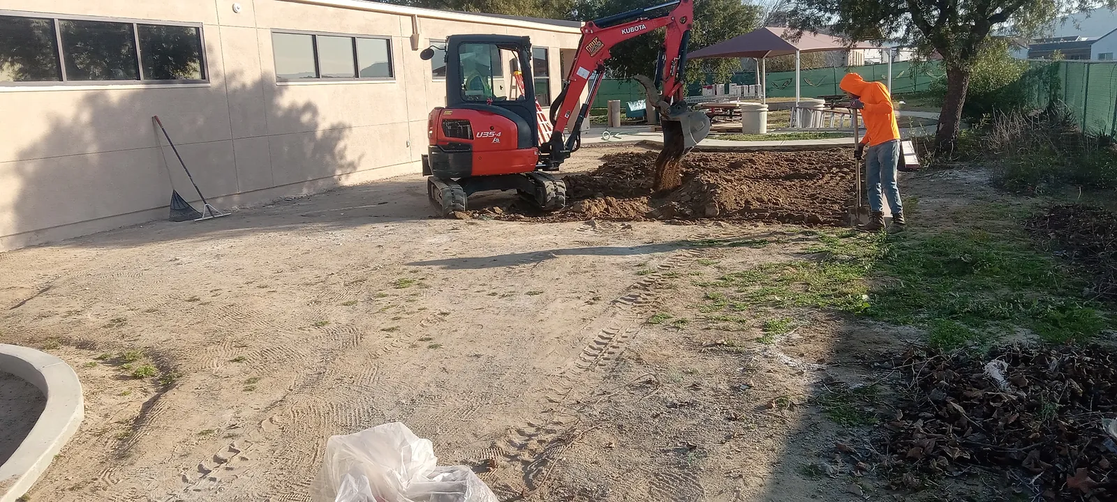 Crew work during a completed decomposed granite installation in Norco