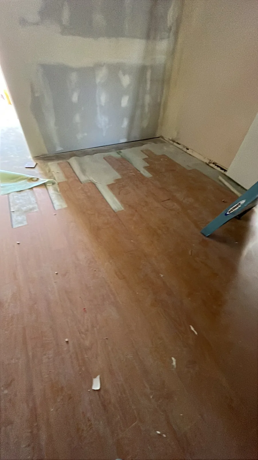 Floor work during a completed ADA restroom remodel in Torrance